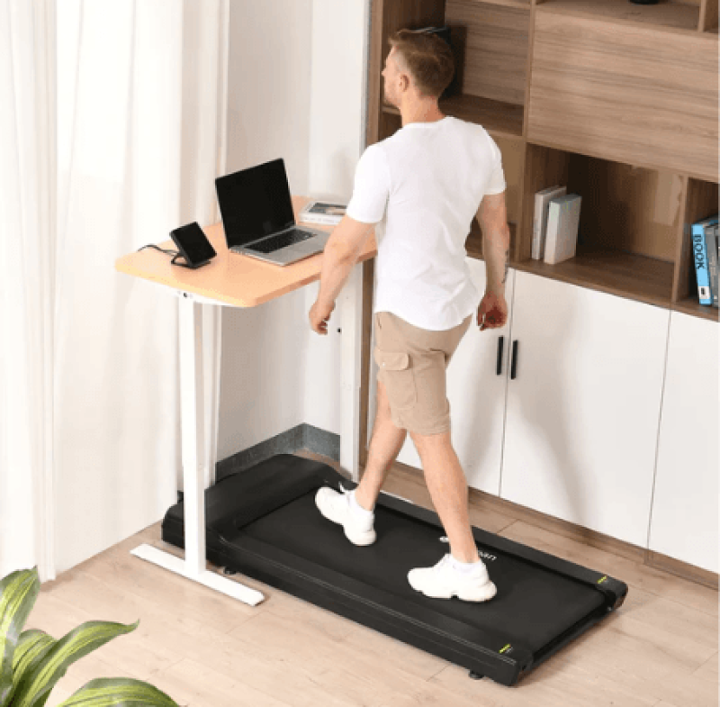 Under-desk walking treadmill TR5000Pro with black desk